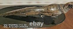 Art Deco sculpture of a golden pheasant on a marble base, signed (Salvatore Mélanie)