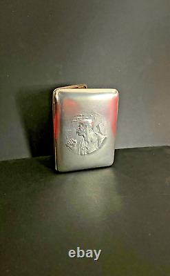 Art Deco silver cigarette case hammered by a worker, signed and hallmarked