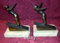 Beautiful Art Deco skier bookends signed Jamar on marble