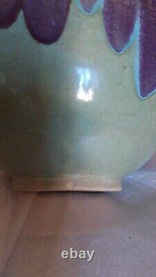 Beautiful and large art deco ceramic cache pot signed TURNAU Paris with a flamed glazed finish.