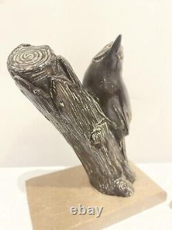 Bird-themed bookends signed M Leducq, Art Nouveau wildlife in bronze.