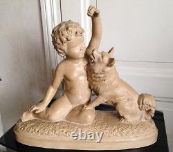Child and Dog Sculpture in Patinated Terracotta Signed B Rez, to be Identified