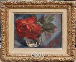 Henry DE WAROQUIER (1881-1970). A red rose in a glass