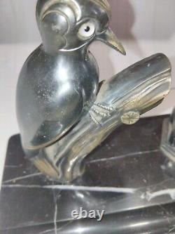 Inkwell, marble base, decorated with a bird. Signed