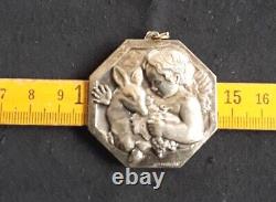 RARE Silver Metal Pendant signed RAY PELLETIER Art Deco Cherub with Fawn