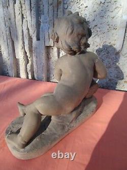 SCULPTURE PUTTO WITH ROSES ART DECO ERA IN TERRACOTTA by RENE MEYNIAL