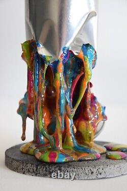 Sculpture graffiti, street art, paint bomb chrome color drips decoration