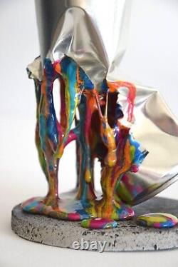 Sculpture graffiti, street art, paint bomb chrome color drips decoration