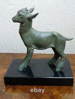 Superb antique sculpture of a green patina Art Deco bronze goat signed BOUSQUET