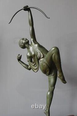 The translation of the title in English is: 'Le Faguays & Susse Diana Archer Bronze Art Deco Sign'
