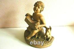 Sculpture terre cuite signée B. RezL Enfant jouant de l'accordéon et son chien